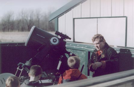 Russ showing the 16" LX200 to some scouts
